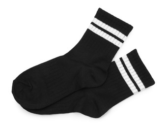 Photo of Pair of soft socks isolated on white, top view