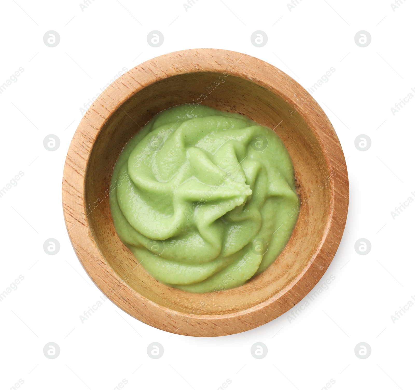 Photo of Hot wasabi paste in bowl isolated on white, top view