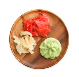 Photo of Hot wasabi paste and ginger isolated on white, top view