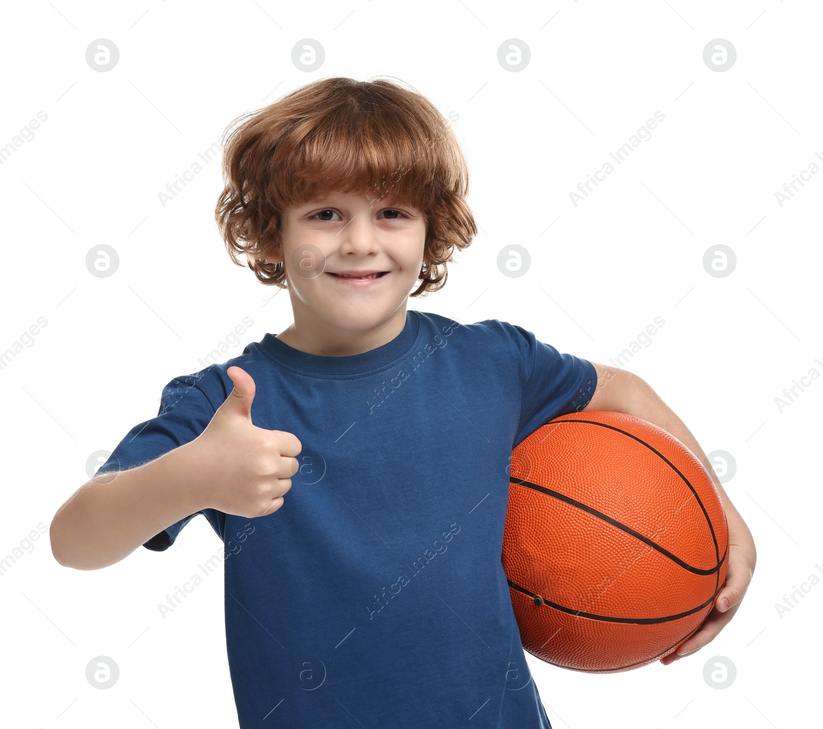 Photo of Little boy with basketball ball showing thumbs up on white background