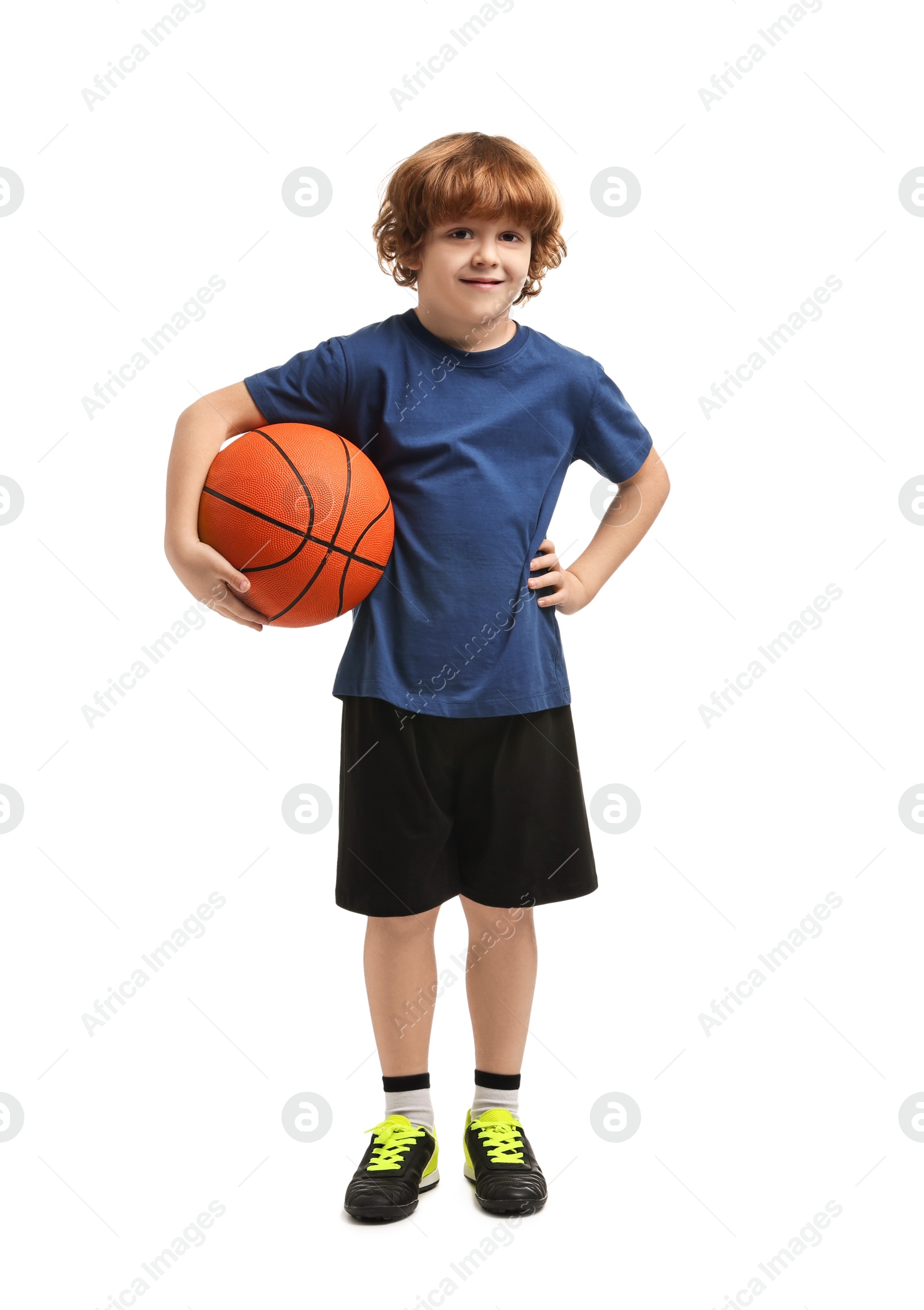 Photo of Little boy with basketball ball on white background