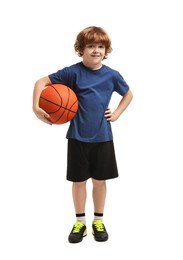 Photo of Little boy with basketball ball on white background