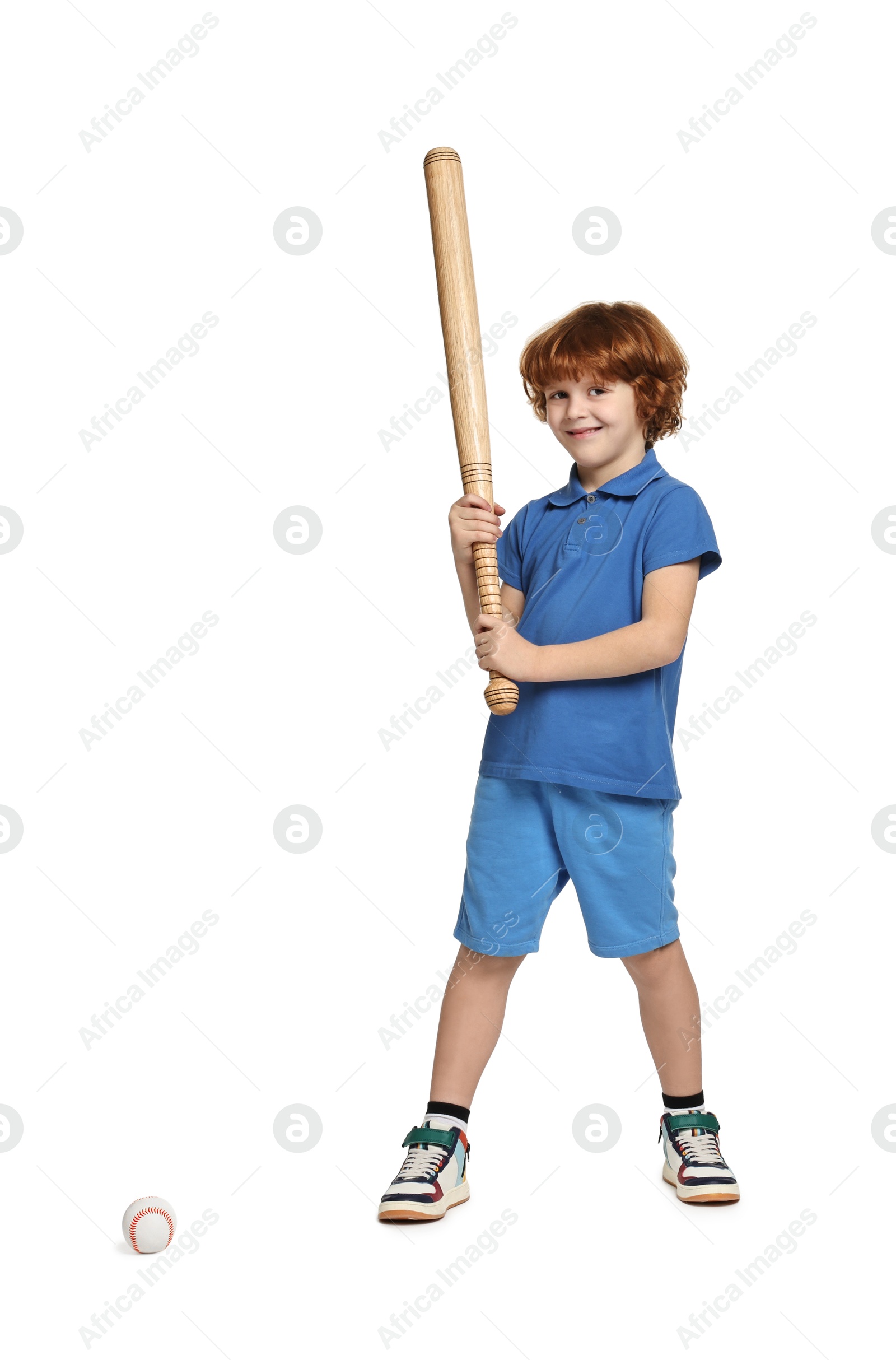 Photo of Little boy with baseball bat on white background