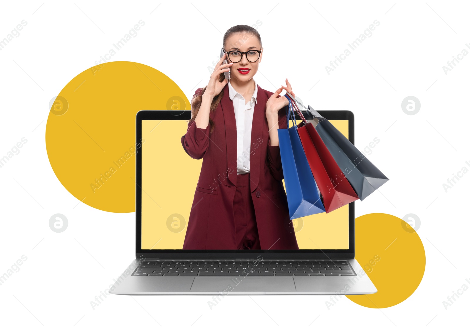 Image of Internet shopping. Happy woman with shopping bags talking on phone and coming out of laptop on color background