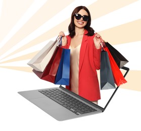 Image of Internet shopping. Happy woman with shopping bags coming out of laptop on color background