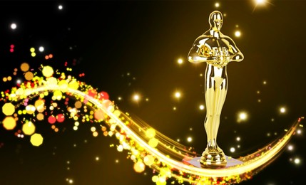 Image of Golden trophy in shape of human figure on dark background with shimmering light trace