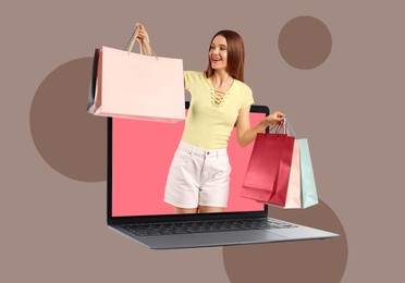 Image of Internet shopping. Happy woman with shopping bags coming out of laptop on color background