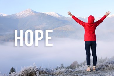 Image of Hope. Woman admiring mountain landscape, back view