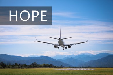 Image of Hope. White airplane landing on runway near mountains