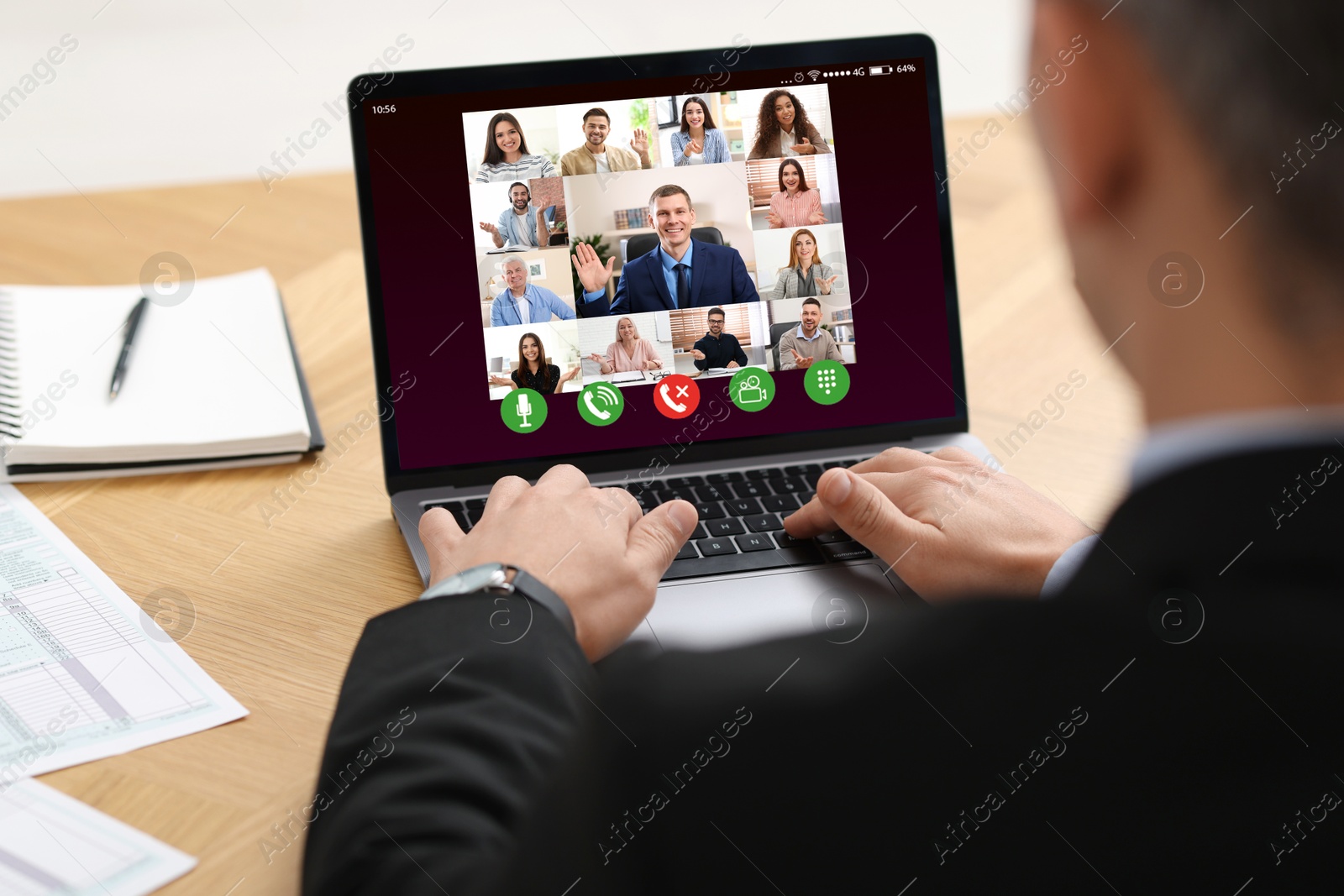 Image of Business meeting. Man using laptop during online video chat at table, closeup