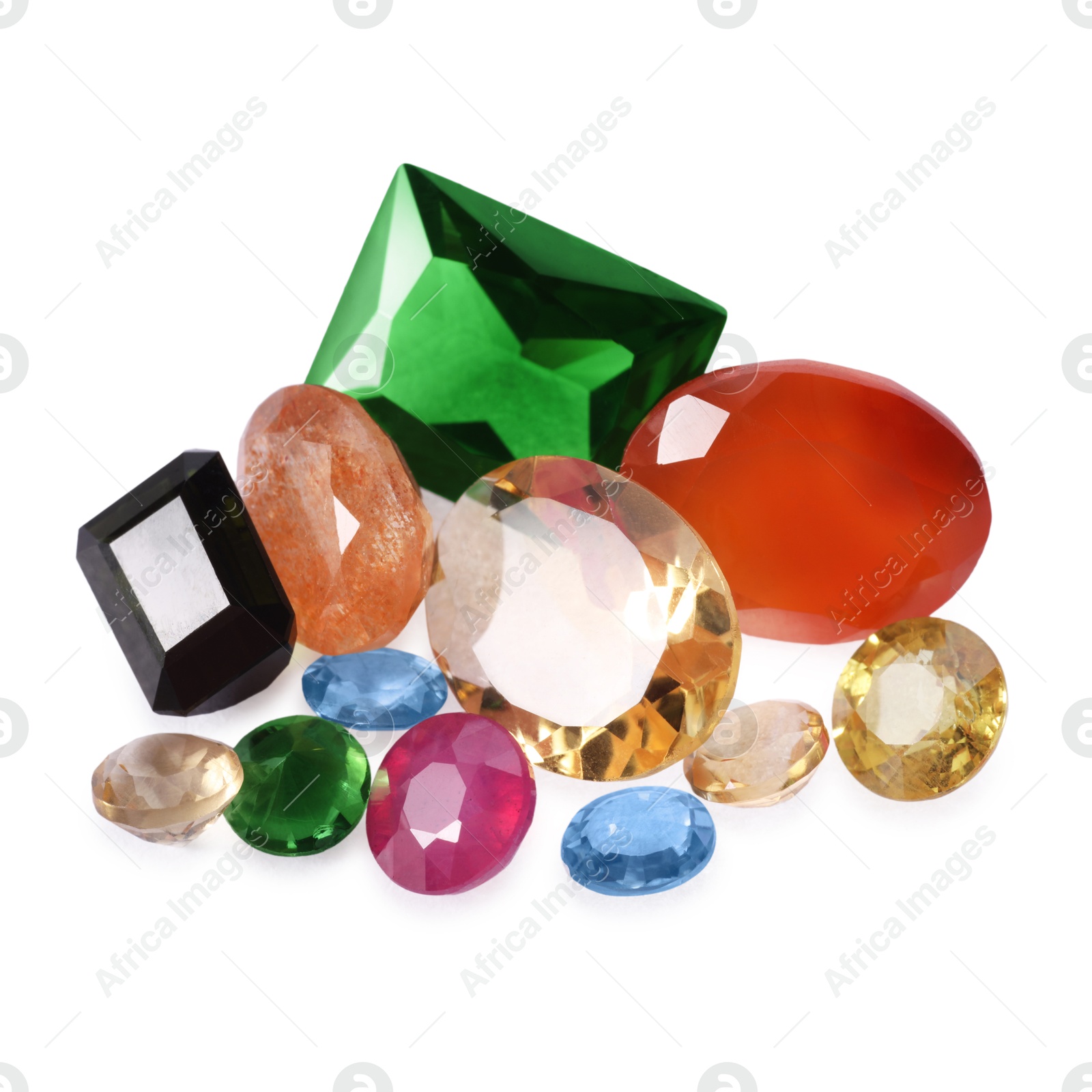 Photo of Different colorful shiny gemstones isolated on white