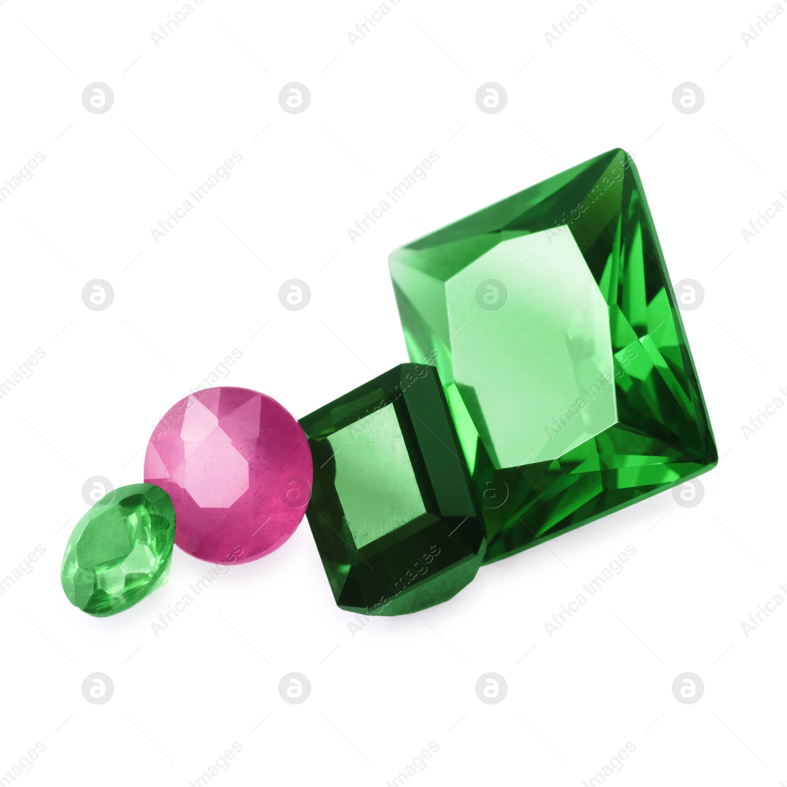 Photo of Different colorful shiny gemstones isolated on white