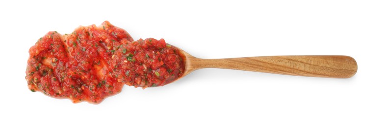 Photo of Tasty salsa sauce in spoon isolated on white, top view