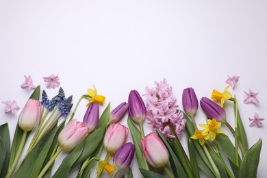 Photo of Beautiful flowers on white background, flat lay. Space for text