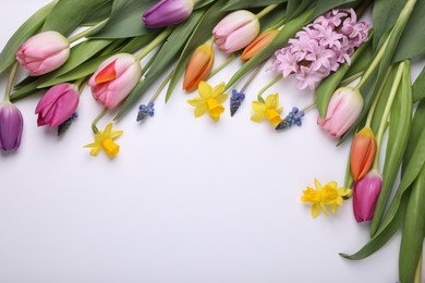 Photo of Beautiful flowers on white background, flat lay. Space for text