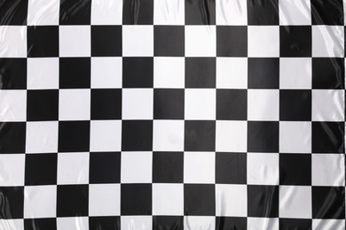 Photo of Checkered finish flag as background, top view