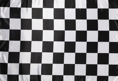 Photo of Checkered finish flag as background, top view