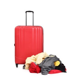 Photo of Suitcase and messy pile of clothes isolated on white