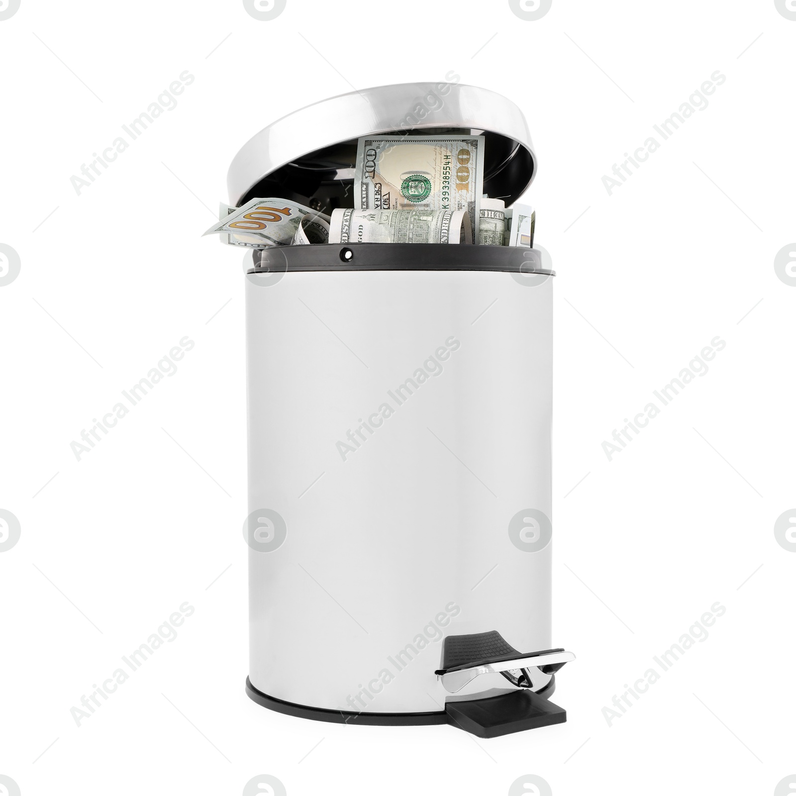 Photo of Dollar banknotes in trash bin on white background