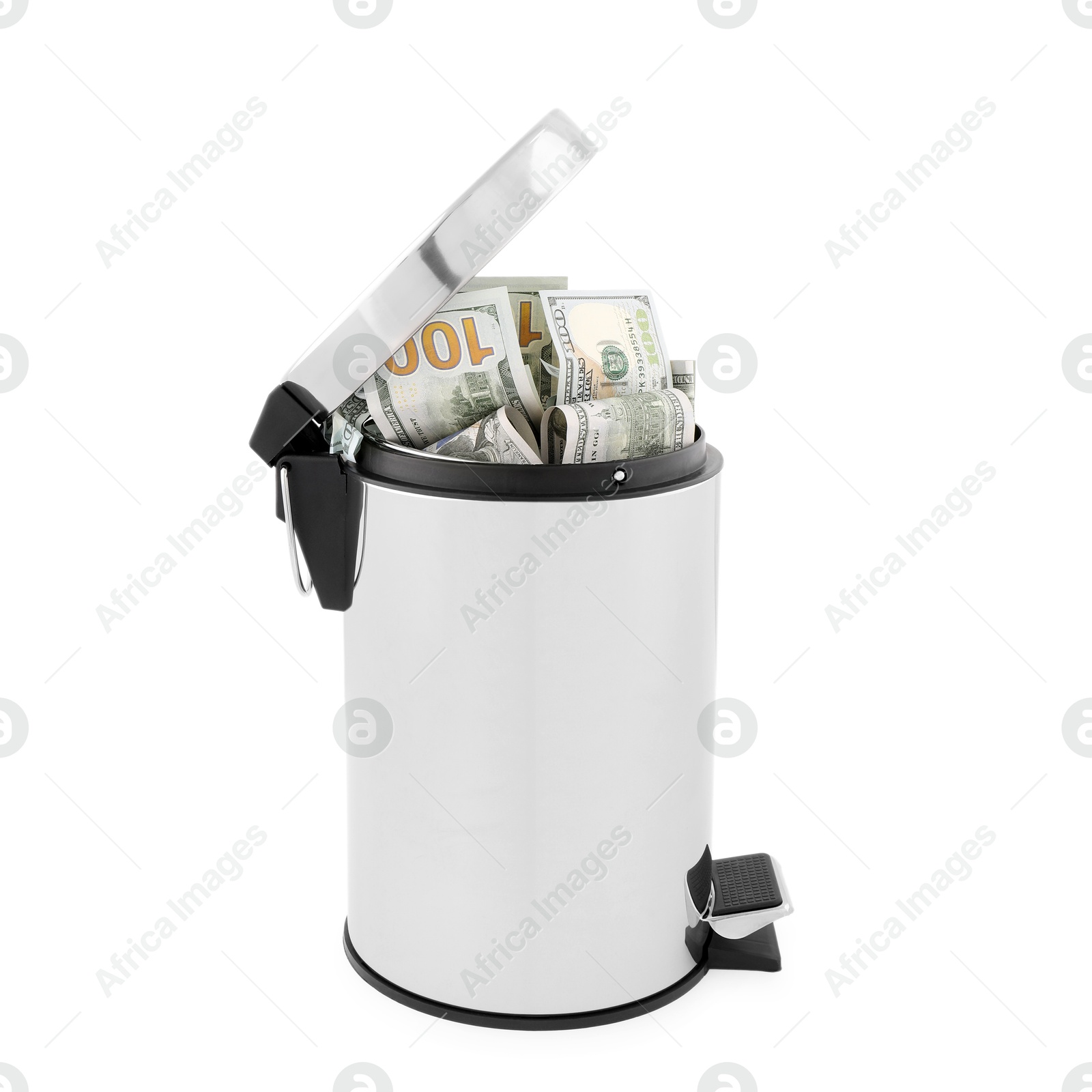 Photo of Dollar banknotes in trash bin on white background