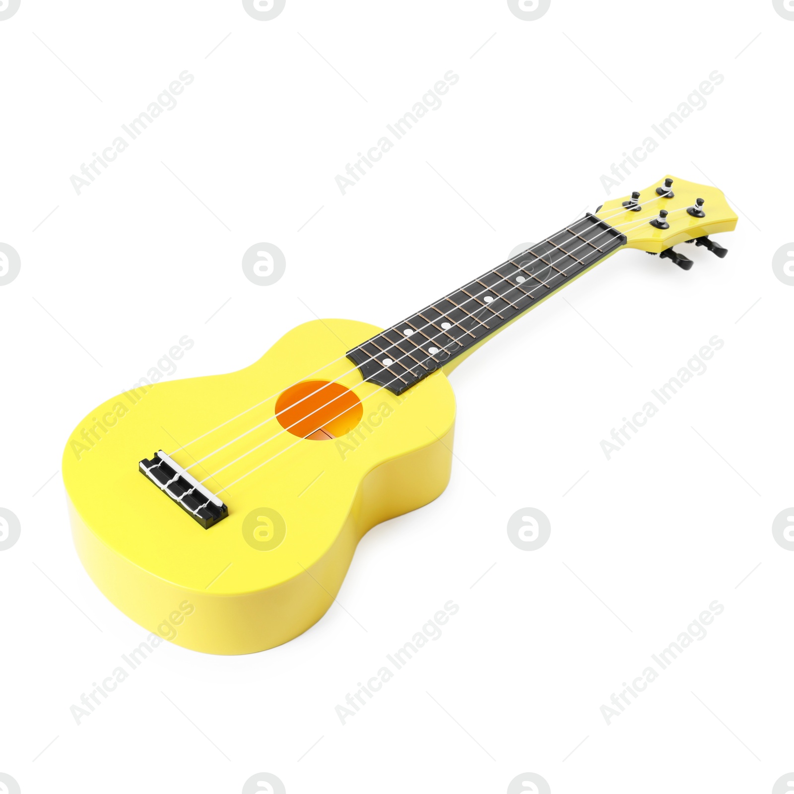 Photo of One ukulele isolated on white. String musical instrument