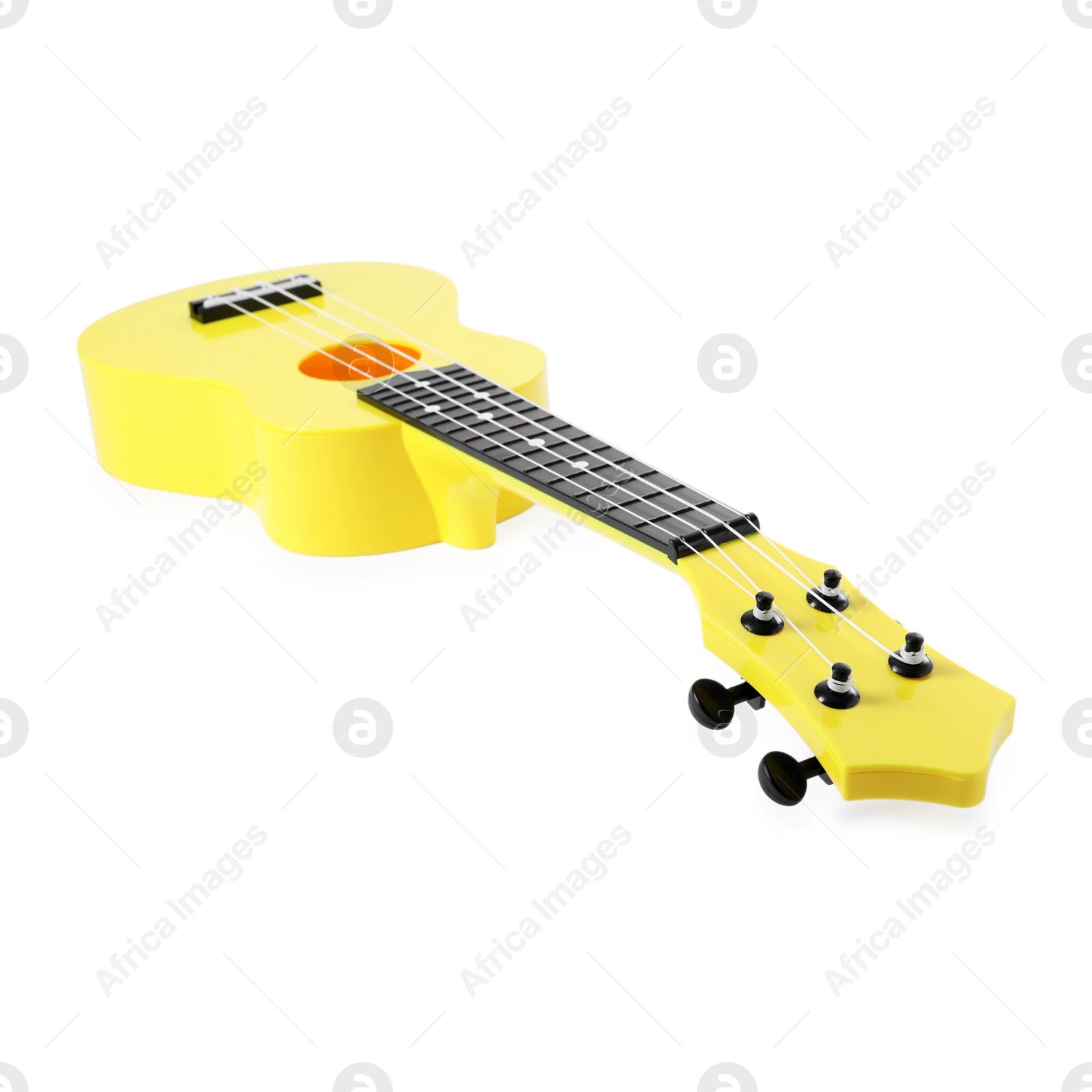 Photo of One ukulele isolated on white. String musical instrument