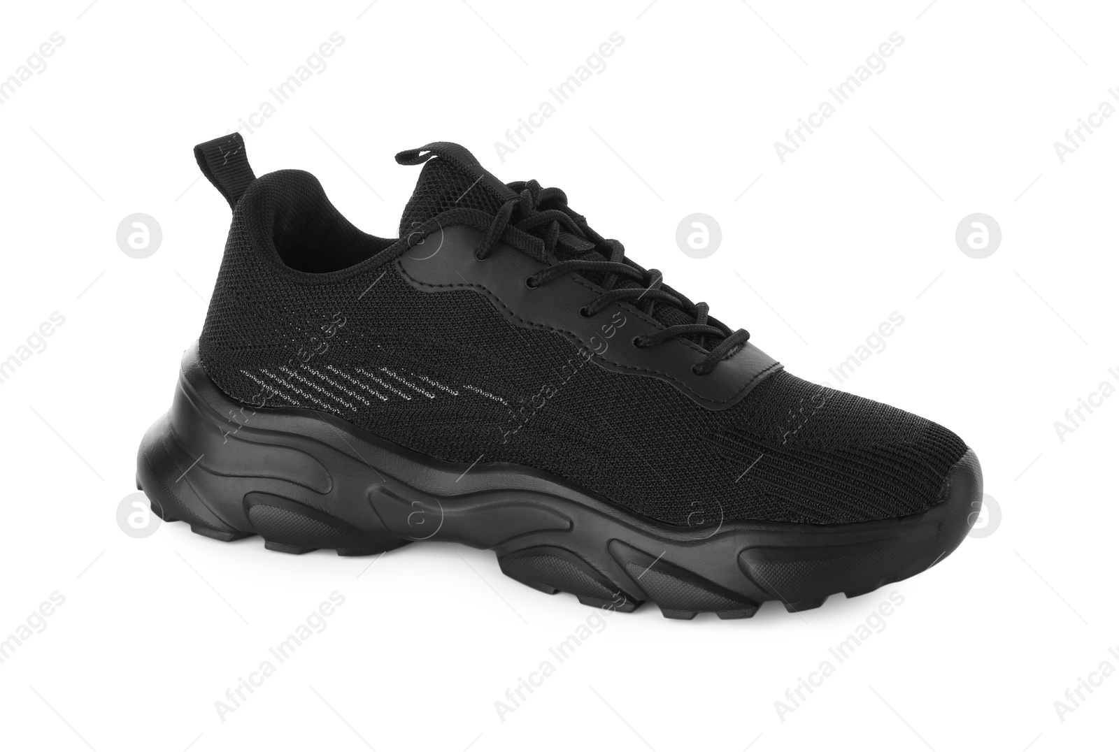 Photo of One stylish black sneaker isolated on white