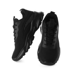 Photo of Pair of black sneakers isolated on white