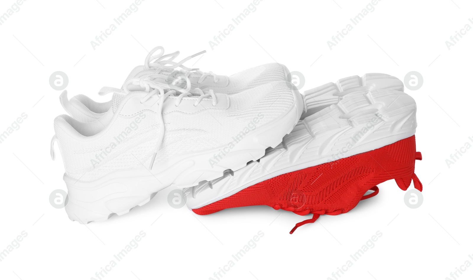 Photo of Colorful sneakers isolated on white. Stylish sportswear