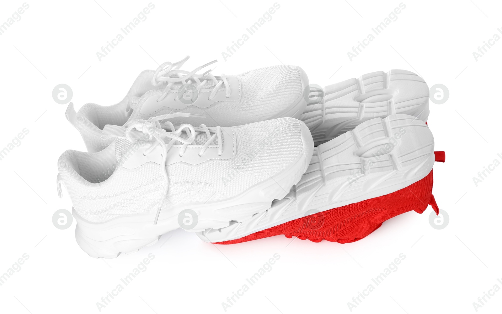 Photo of Colorful sneakers isolated on white. Stylish sportswear