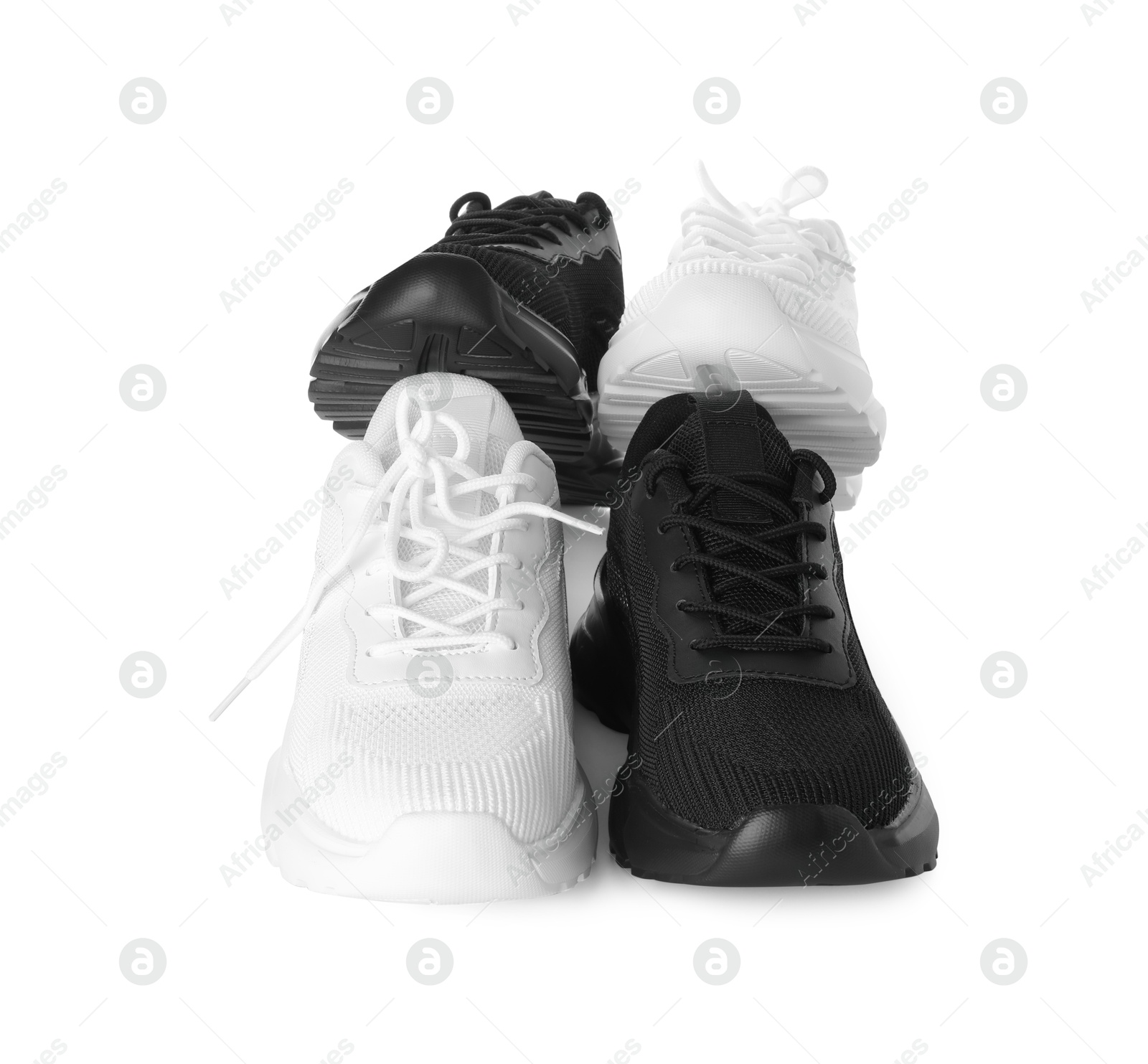 Photo of Colorful sneakers isolated on white. Stylish sportswear