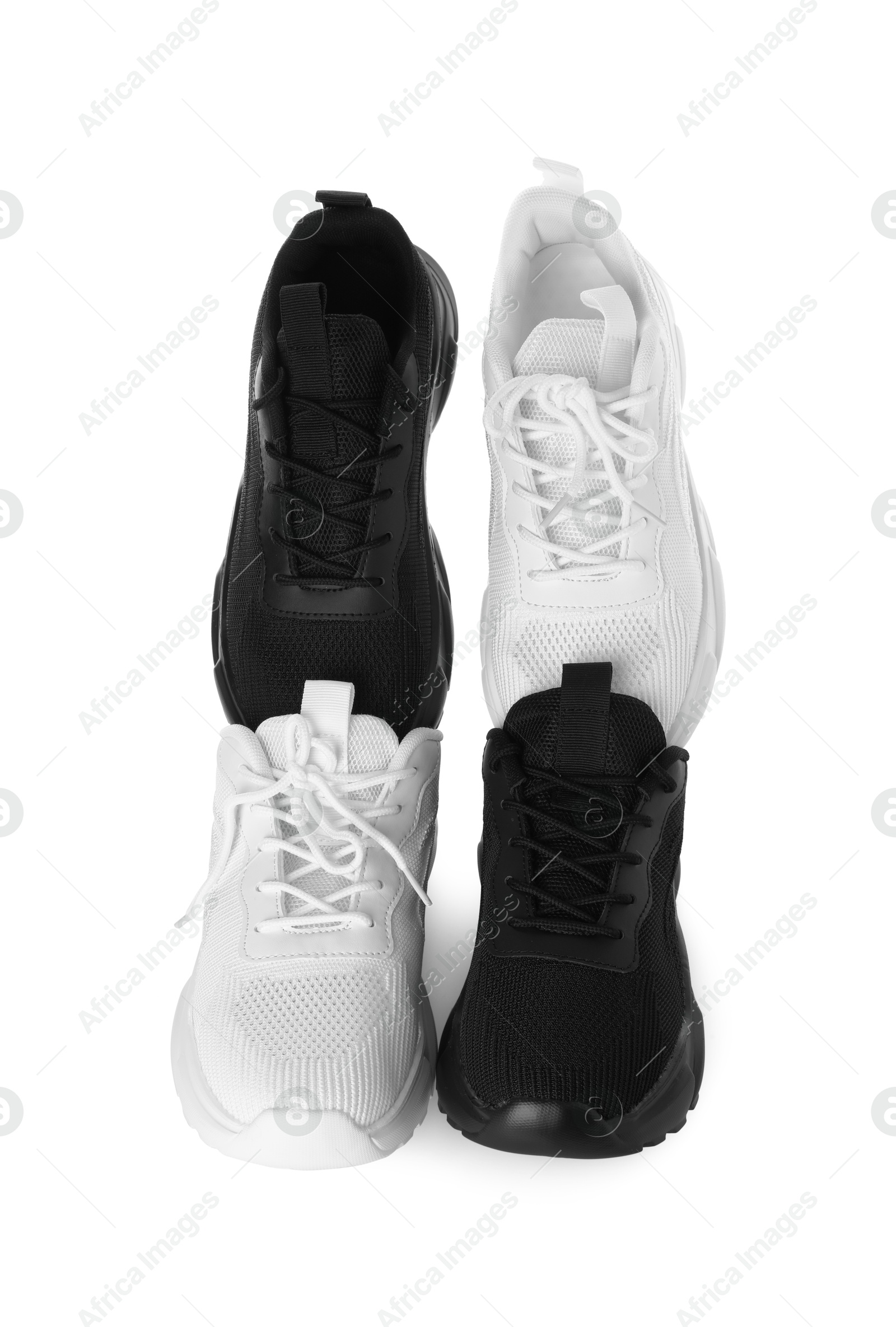 Photo of Colorful sneakers isolated on white. Stylish sportswear