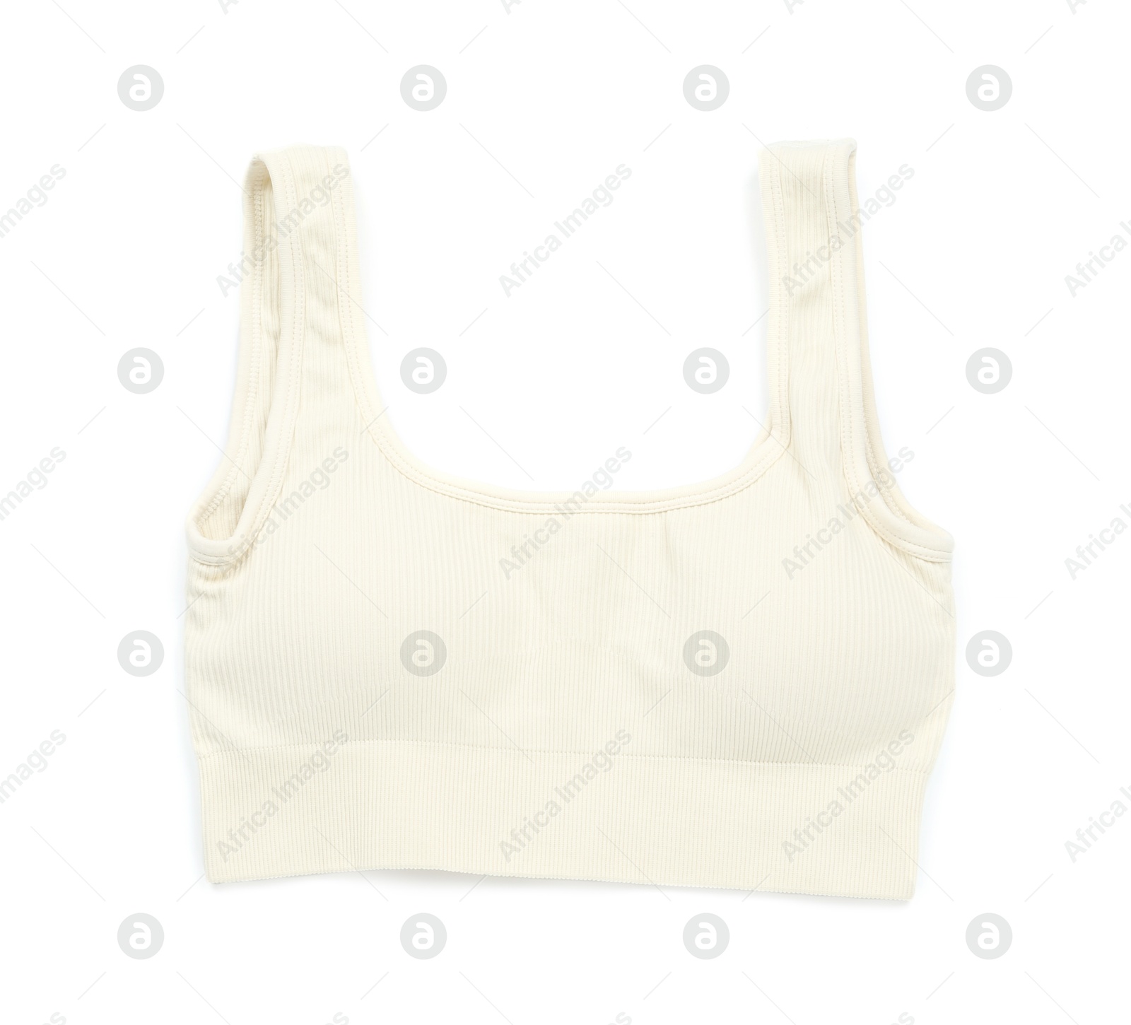 Photo of Beige women's sports bra isolated on white, top view