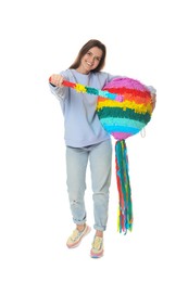 Photo of Happy woman with colorful pinata and stick on white background