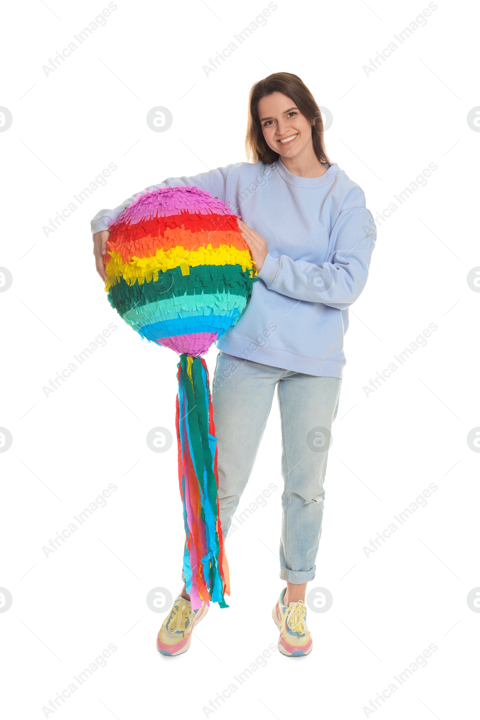 Photo of Happy woman with colorful pinata on white background