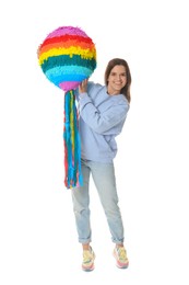 Photo of Happy woman with colorful pinata on white background