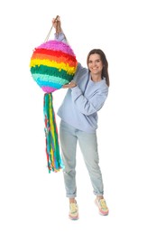 Photo of Happy woman with colorful pinata and stick on white background