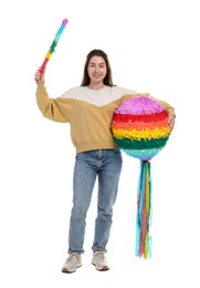 Happy woman with colorful pinata and stick on white background