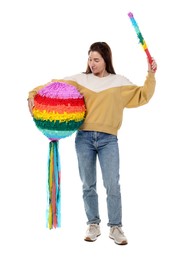 Photo of Woman with colorful pinata and stick on white background