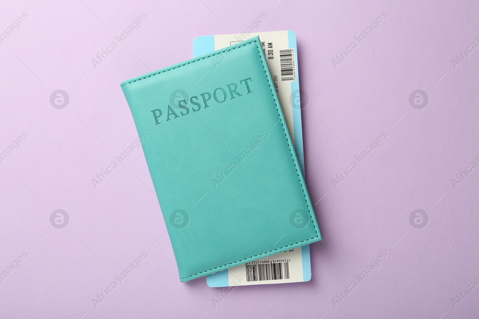 Photo of Passport with ticket on lilac background, top view