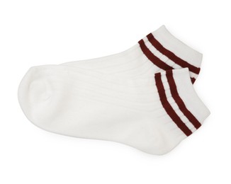 Photo of Pair of soft socks isolated on white, top view