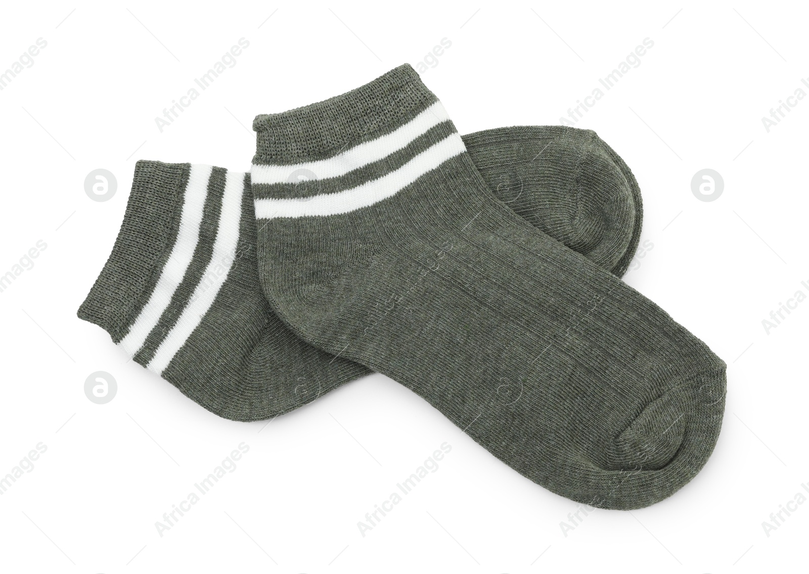 Photo of Pair of soft socks isolated on white, top view