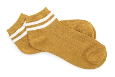 Photo of Pair of soft socks isolated on white, top view