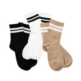 Photo of Pairs of soft socks isolated on white, top view