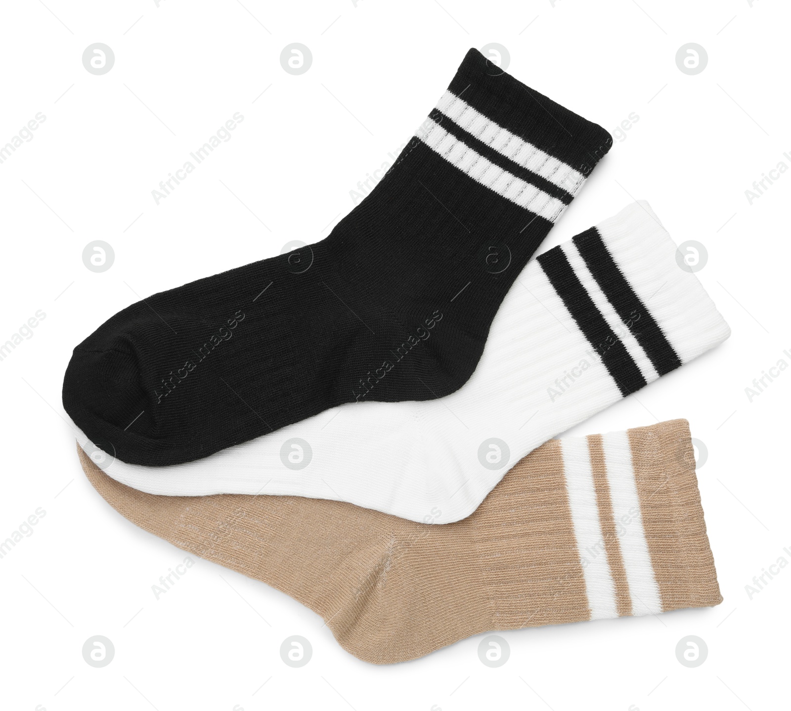 Photo of Pairs of soft socks isolated on white, top view