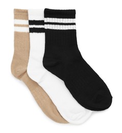 Photo of Pairs of soft socks isolated on white, top view