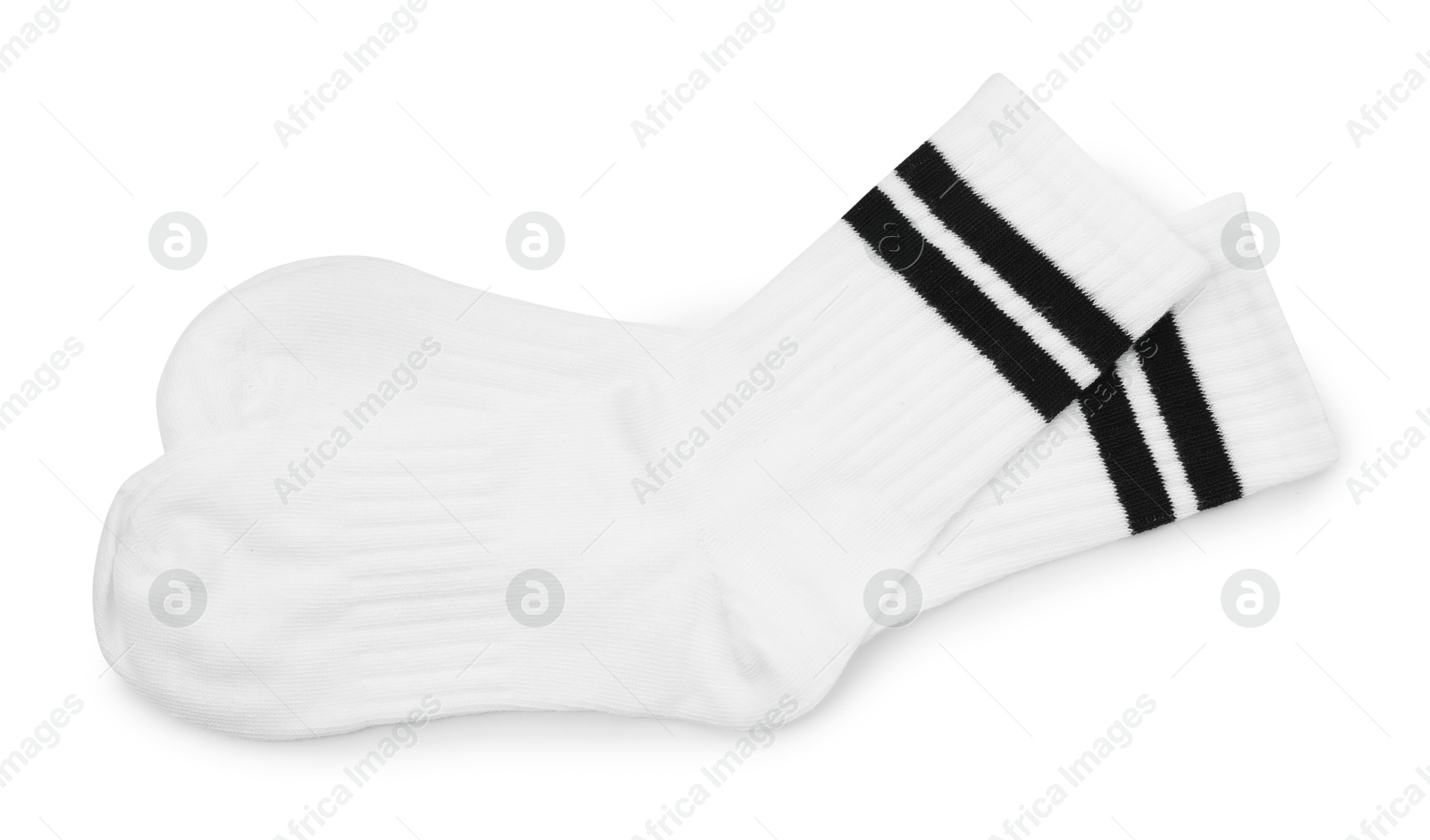 Photo of Pair of soft socks isolated on white, top view