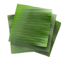 Photo of Pieces of banana leaves isolated on white, top view. Traditional meal serving