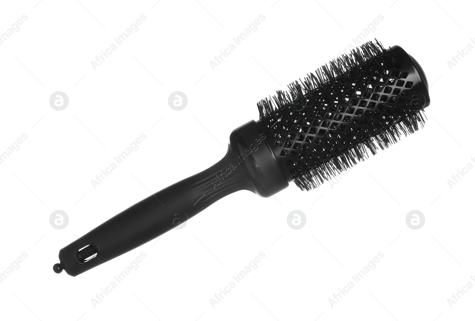 Photo of Hairdresser tool. Round brush isolated on white