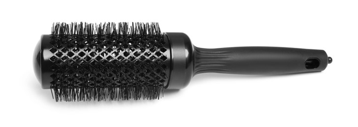 Photo of Hairdresser tool. Round brush isolated on white, top view